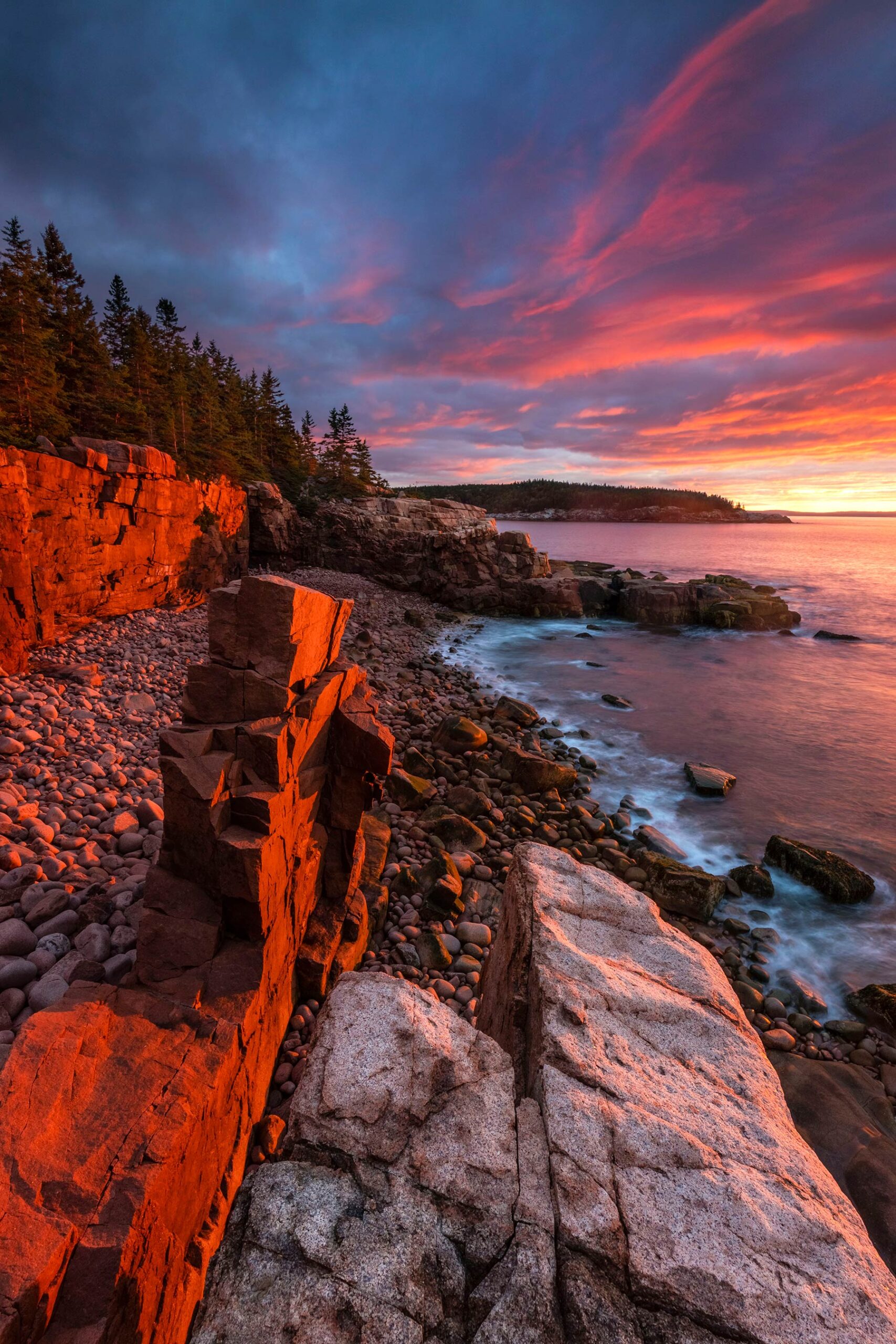 A granite column formed over 15,000 years of receding glaciers rests on the beach after being knocked over by a massive wave during a 2024 storm.